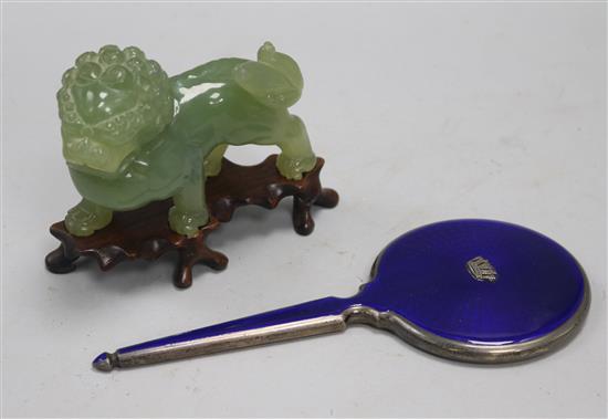 A hardstone Chinese lion and enamel mirror